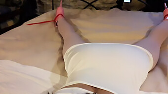 Laura'S Bound And Silenced In A White Dress, Pink Pantyhose, And Heels On A Bed